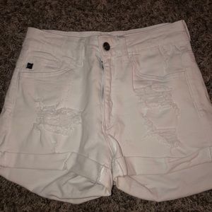 White distressed jean shorts